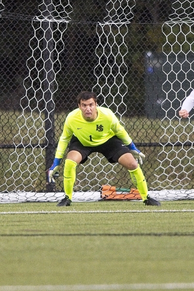 Wills Huddleston playing soccer on the field