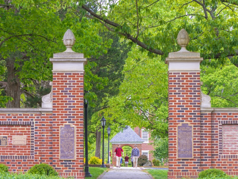 students walking through memorial gates at H-SC