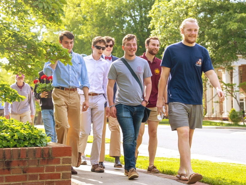 students walking through campus together at H-SC