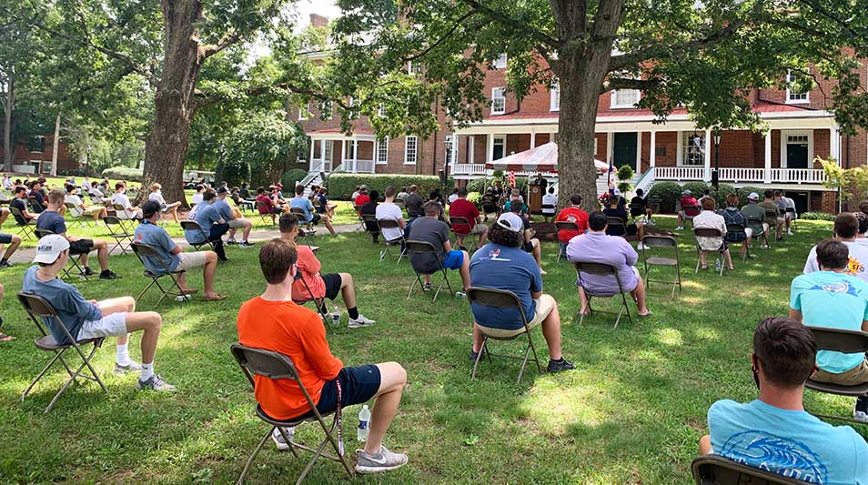 Freshmen gather 6 feet apart on Venable Lawn for opening remarks