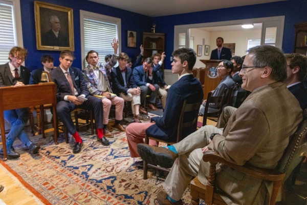 Dr. Marc Hight with students in the UPLS hall