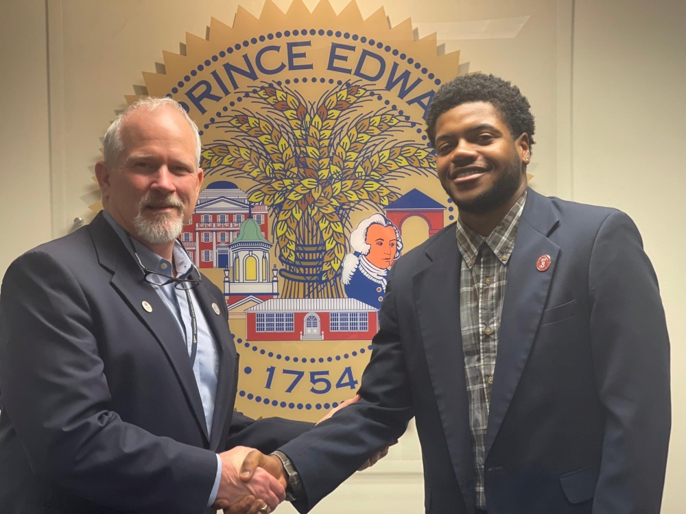 Tramell Thompson ’24 with Prince Edward County Administrator Doug Stanley