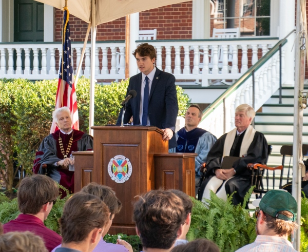 Drew Blankenship ’25 speaking to the college coommunity