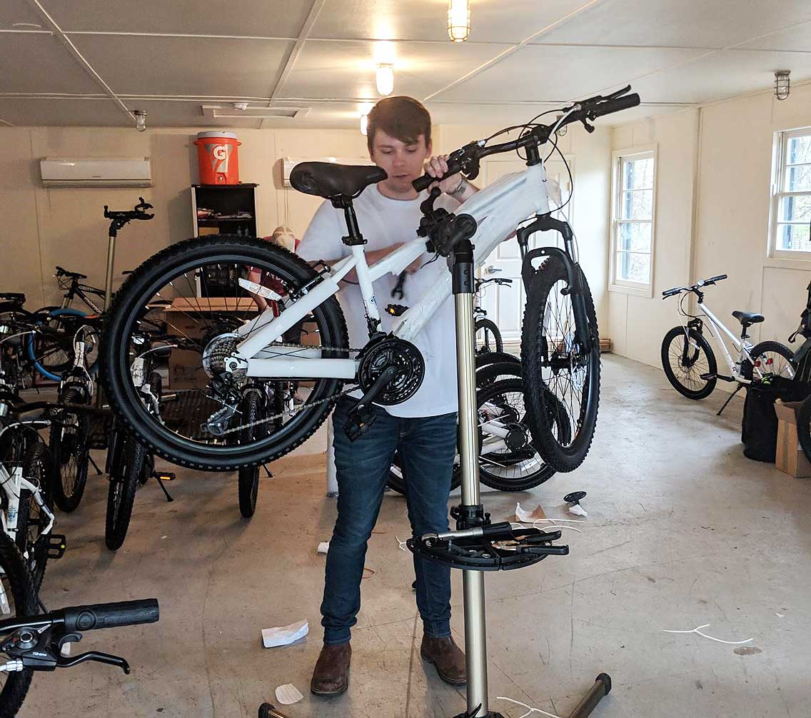 Andrew Howell '20 building a bike