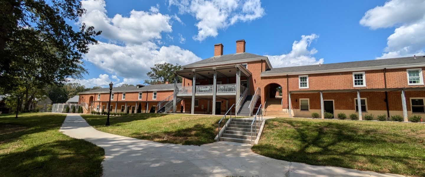 Whitehouse Dorm, a brick colonial, on a clear day at Hampden-Sydney College